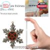 Close-up showing 3 to 4 millimeter thickness of ornament with a hand holding a pentagram snowflake piece!