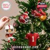Nebraska Football-themed ornaments hung on a green Christmas tree, emphasizing holiday spirit and team pride!