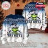Side-by-side views of a New England Patriots Christmas sweater featuring the Grinch and detailed holiday elements front and back!