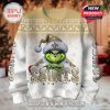 Front view of a holiday sweater featuring the Grinch in a Saints Santa hat, with snowflakes, lights, and bold SAINTS lettering!