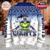 Back of a Grinch Christmas sweater with New York Giants colors, logo, snowflakes, and wintery knit patterns!