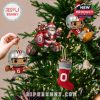 Ohio State ornaments arranged on a festive tree showing off school pride with fun miniature decorations in red, white, and silver!
