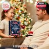 Father and daughter share a festive moment, with the child presenting the Ole Miss Rebels Advent Calendar 2025 as a holiday gift under the Christmas lights!