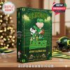 A colorful advent calendar box branded with Oregon Ducks and Peanuts characters placed on a holiday-themed tabletop near a lit Christmas tree!