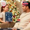 Father and daughter share a joyful Christmas gift exchange with the Penn State Advent Calendar box featured prominently under the lights!