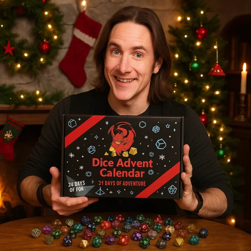 Random Dice Advent Calendar 2025 box surrounded by assorted polyhedral dice in multiple colors