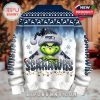 Back side of the Seahawks Grinch Christmas sweater featuring consistent holiday patterns, team name, and the central Grinch graphic.