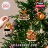 Miniature ornaments featuring Texas Longhorns logos and festive designs placed on a holiday tree with golden lights and seasonal flair!