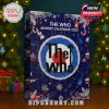 The Who-themed advent calendar on a tabletop with glowing lights and ornaments in the background, designed for music fans and holiday collectors!