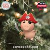 Cute pig ornament with pirate costume swinging from a tree, showcasing one of the unique designs from the Toy Chest calendar set!