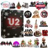 A wide array of band-inspired Christmas decorations with the U2 Advent Calendar box in the center, showing guitars, festive outfits, and detailed scene pieces!