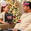Father and daughter sharing a gift moment with the U2-themed advent box, showing it as a family-friendly item that spans generations of music lovers!