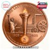 Copper toned historical coin with Statue of Liberty torch industrial gears and deep engraved background details!