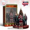 AC/DC figurine set in packaging, featuring band members in Christmas sweaters and holiday decorations.