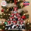 Christmas-themed football ornament showing a pyramid of Alabama players hanging from a red ribbon, enhanced with snow effect and championship trophy at the base!