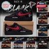 NFL sneakers with black base, vibrant team colors, official logos, and customizable name area from the Back in Black series!
