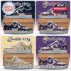 A pair of Hello Kitty sneakers featuring the New York Giants and Minnesota Vikings colors and logos, with cute Hello Kitty illustrations.