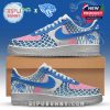 Jaguars-inspired sneaker in white, pink, and blue, with net-like scales, team logo on heel, and cartoon design accents from Zootopia!