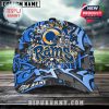 Blue and gold graffiti-style Rams cap featuring the team's logo and editable name field on the front brim.