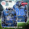Detroit Lions graffiti-style hoodie with vibrant blue visuals, team branding, and custom name and number on the back.