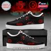 Steelers and Stranger Things crossover sneakers in red and black horror visuals with signature branding.