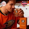 Anaheim Ducks themed whiskey glass featured post-game at the rink, paired with its orange collector’s box in a player setting!