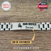 Flat-lay view of stainless Sun Devils bracelet on rustic surface with custom name space!