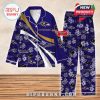 Purple Baltimore Ravens pajama set with gold and white stripes, floral accents, and customizable name areas!
