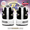 Heel-focused image of Christmas-themed sports sneakers with Santa-style team logos and a white heel pull tab!