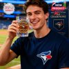 Fan in Blue Jays t-shirt raises the official 2025 AL Champions whiskey glass, capturing the victory vibe at the stadium!