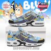 Colorful Bluey-themed shoes featuring paw prints and cartoon graphics positioned on a white box, set against a vivid animated background!