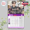 BTS 2026 calendar July page featuring V, layered with polaroid-style photos, collage elements, and reflective handwritten lyrics.