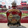 50th Anniversary Buccaneers ornament with ship atop a bottle, featuring the engraving and a view of Raymond James Stadium in the background.