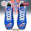 Overhead look at holiday-themed sneakers with Buffalo Bills logos wearing Santa hats and customizable text areas on a blue-red color base!