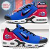 Side view of a blue and red holiday-themed sneaker showing festive logo, name customization zone, and air-cushioned white sole!