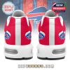 Back angle of Christmas-style Bills sneakers with red heel panels and fun seasonal logo prints!