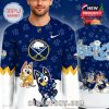 Man wearing navy blue Buffalo Sabres Bluey Night hockey jersey with cartoon dogs playing hockey!