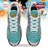 Side profile of Dragon Ball sneaker featuring anime graphics, Bulma print, and breathable air unit midsole, held in hand inside shoebox!