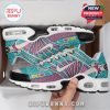 Overhead view of anime-themed sneakers with white laces, turquoise and pink upper, and printed anime patterns from Dragon Ball!