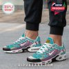 Model wearing anime-themed sneakers with printed Dragon Ball details, pink and teal tones, and air-cushioned soles for casual streetwear looks!