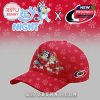 This image shows a red hockey cap with cartoon dogs and sporty logo on the side!