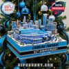 Close up of a Carolina Panthers stadium ornament with city buildings and anniversary text on the base!