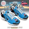 A festive pair of sneakers in Carolina Panthers colors with a Santa-hat-wearing panther logo, blue mesh front, black heel, and white laces and sole!
