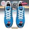 Side profile of the Carolina Panthers sneakers inside a box, showing blue and black panels, custom name area, and festive panther logo!
