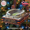 A miniature Soldier Field stadium ornament for the Chicago Bears 106th Anniversary hanging on a lit Christmas tree.