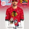 Red Chicago Blackhawks hockey sweater with cartoon characters and festive design!