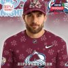 Man modeling Bluey x Colorado Avalanche hockey jersey and cap!