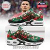 Side view of festive CR7 sneakers on a white box, highlighting Christmas graphics and signature detail!