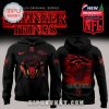 Black Stranger Things hoodie featuring Broncos branding and vivid red Hellfire Club details.