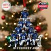 Dallas Cowboys Christmas ornament showing a stacked team of nine players in uniform on a decorated tree, with a red hanging ribbon and a trophy beside them, celebrating NFL spirit!